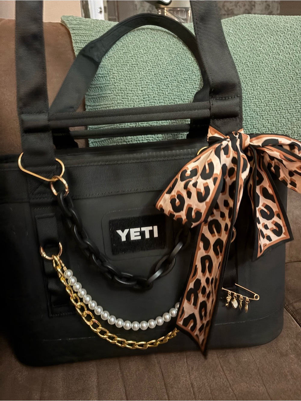 YETI Black Camino 18L zip with Leopard-Print Scarf and Gold Accents